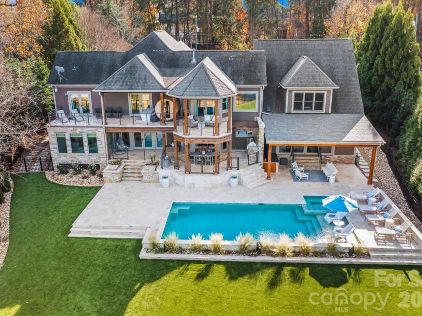 16407 Jetton Road, Cornelius, NC 28031.  MLS# CAR4326392, YatesRealty ID 881. Sprawling backyard oasis - ake vibes and good times