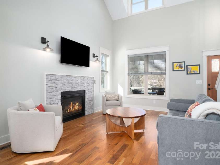 66 Deaver Street, Asheville, NC 28806.  MLS# CAR4217657, YatesRealty ID 8810. Living Room has Gas Fireplace with Ledgestone Surround