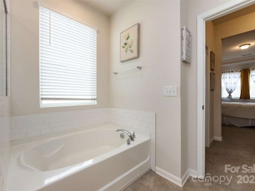 3100 Cheyney Park Drive, Charlotte, NC 28269.  MLS# CAR4247612, YatesRealty ID 8811. Primary bathroom