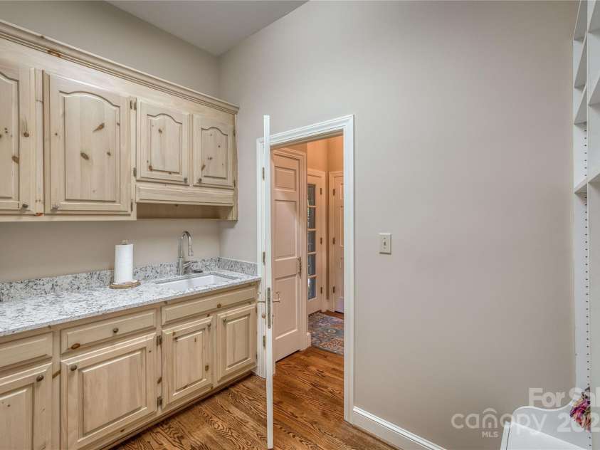 101 Woodland Drive, Morganton, NC 28655.  MLS# CAR4183990, YatesRealty ID 8812. Mudroom with additional cabinetry & sink off the kitchen