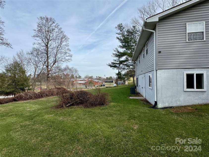 1031 7th Avenue, Hendersonville, NC 28791.  MLS# CAR4207190, YatesRealty ID 8813. Rear Elevation