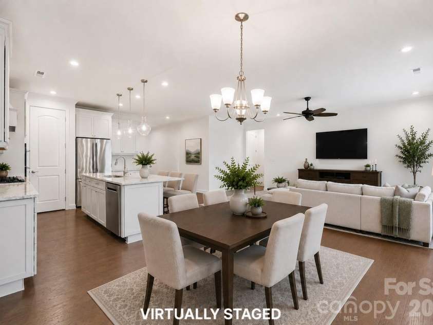 3024 Marchers Trace Drive, Charlotte, NC 28227.  MLS# CAR4393087, YatesRealty ID 8813. Virtually Staged Living / Kitchen / Dining