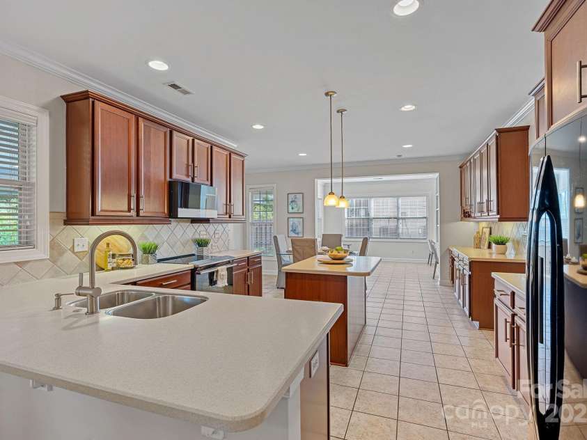 642 Vega Street, Concord, NC 28027.  MLS# CAR4248597, YatesRealty ID 8816. Breakfast Bar and Island for easy entertaining!