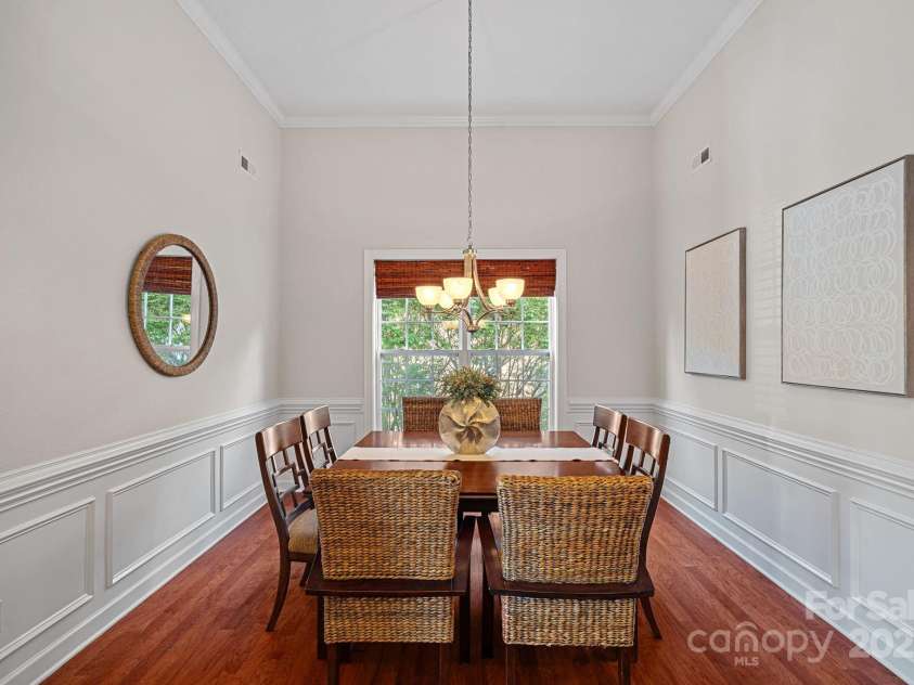 642 Vega Street, Concord, NC 28027.  MLS# CAR4248597, YatesRealty ID 8816. Gorgeous Dining Room with upgraded wainscoting