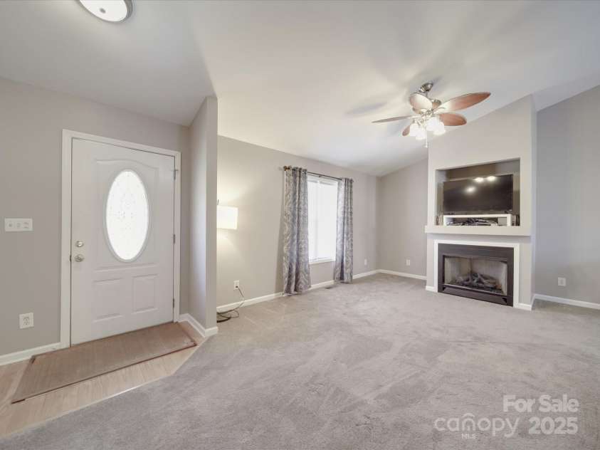 115 Scotch Irish Lane, Troutman, NC 28166.  MLS# CAR4223463, YatesRealty ID 8819. Living room