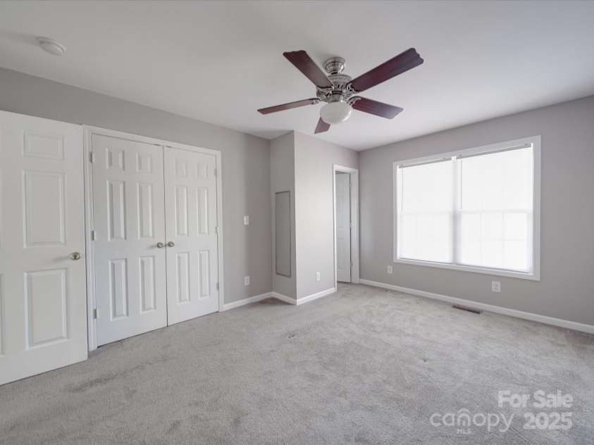 115 Scotch Irish Lane, Troutman, NC 28166.  MLS# CAR4223463, YatesRealty ID 8819. Primary bedroom with ensuite