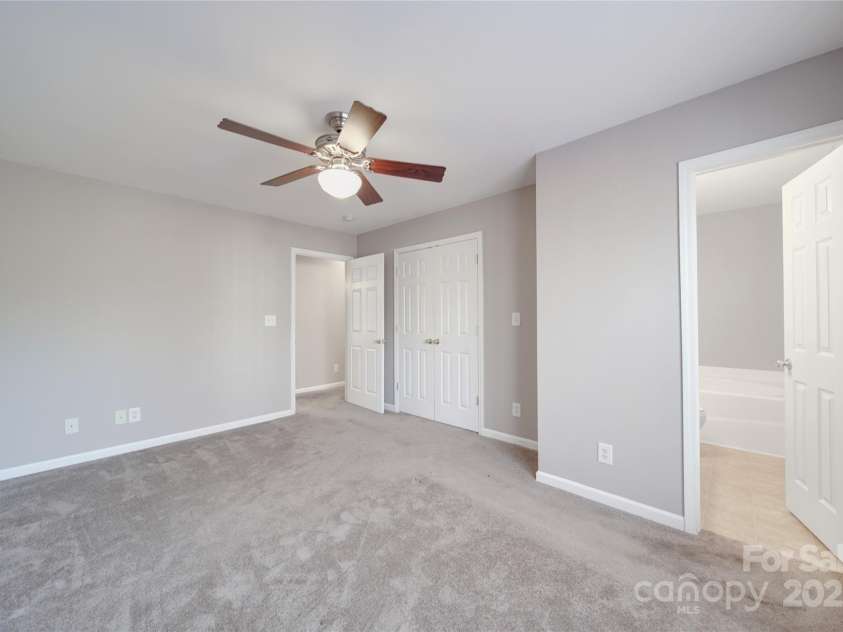 115 Scotch Irish Lane, Troutman, NC 28166.  MLS# CAR4223463, YatesRealty ID 8819. Primary bedroom with ensuite
