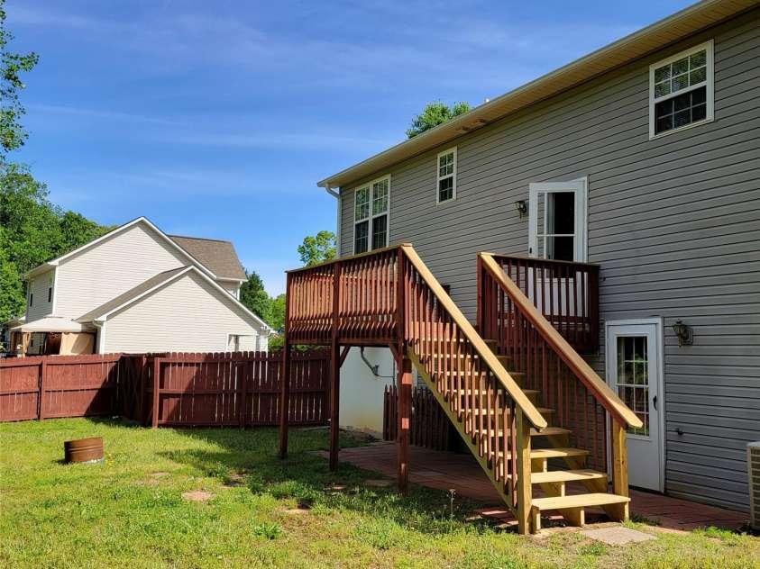 115 Scotch Irish Lane, Troutman, NC 28166.  MLS# CAR4223463, YatesRealty ID 8819. Walkout to backyard from basement or from deck