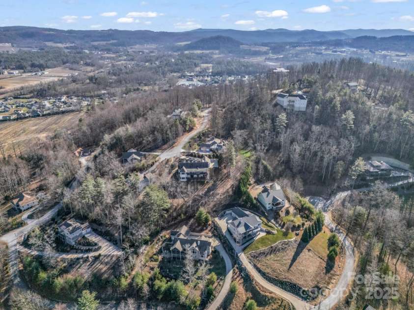 143 Lindsley Court, Hendersonville, NC 28792.  MLS# CAR4211464, YatesRealty ID 8821. Drone shot off homes.
