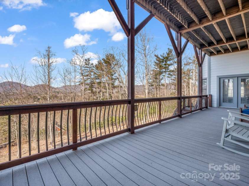 143 Lindsley Court, Hendersonville, NC 28792.  MLS# CAR4211464, YatesRealty ID 8821. Lower level composite deck