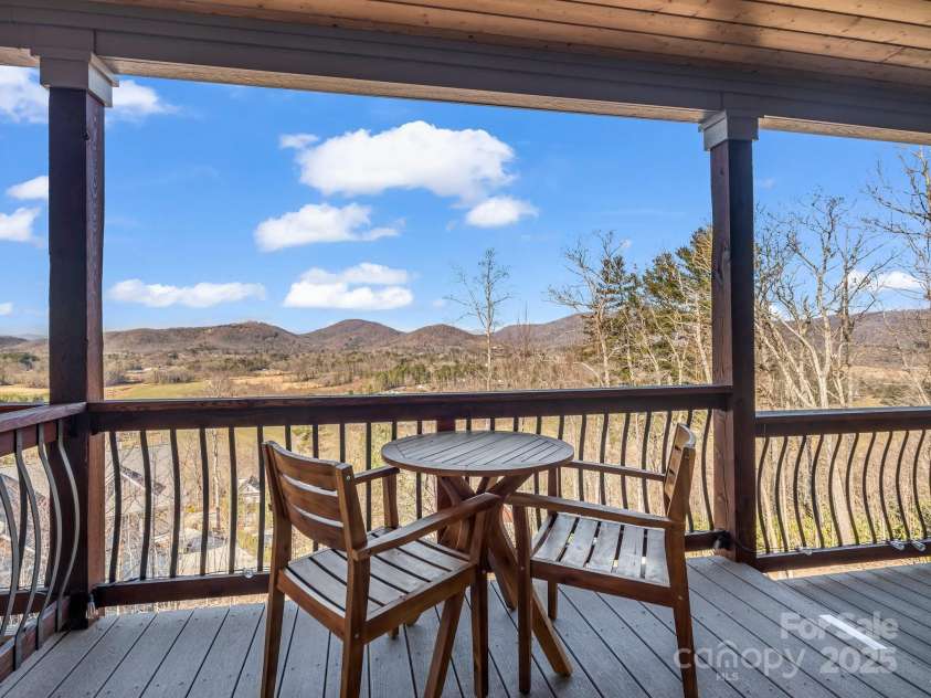 143 Lindsley Court, Hendersonville, NC 28792.  MLS# CAR4211464, YatesRealty ID 8821. Lower level deck views.