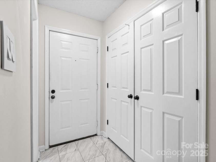 102 Cedar Forest Trail, Asheville, NC 28803.  MLS# CAR4292166, YatesRealty ID 8827. Entryway with updated tile
