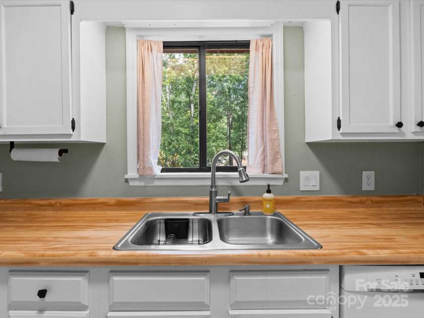 102 Cedar Forest Trail, Asheville, NC 28803.  MLS# CAR4292166, YatesRealty ID 8827. Peaceful view while doing dishes