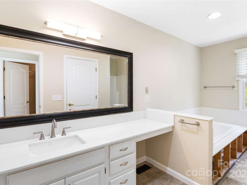 151 Canaan Drive, Candler, NC 28715.  MLS# CAR4248750, YatesRealty ID 8828. 