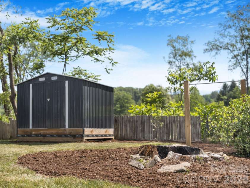 105 Smith Graveyard Road, Asheville, NC 28806.  MLS# CAR4384560, YatesRealty ID 8834. Convenient Storage Shed