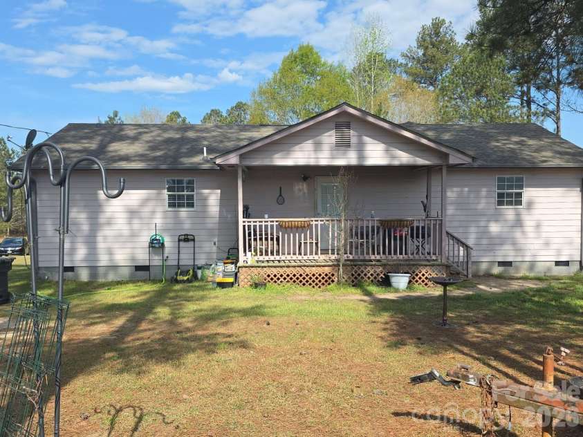 1097 Stadium Road, Pageland, SC 29728.  MLS# CAR4361056, YatesRealty ID 8835. Back porch
