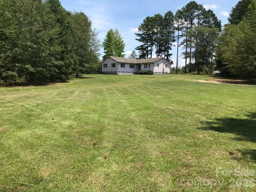 1097 Stadium Road, Pageland, SC 29728.  MLS# CAR4361056, YatesRealty ID 8835. Front view from road