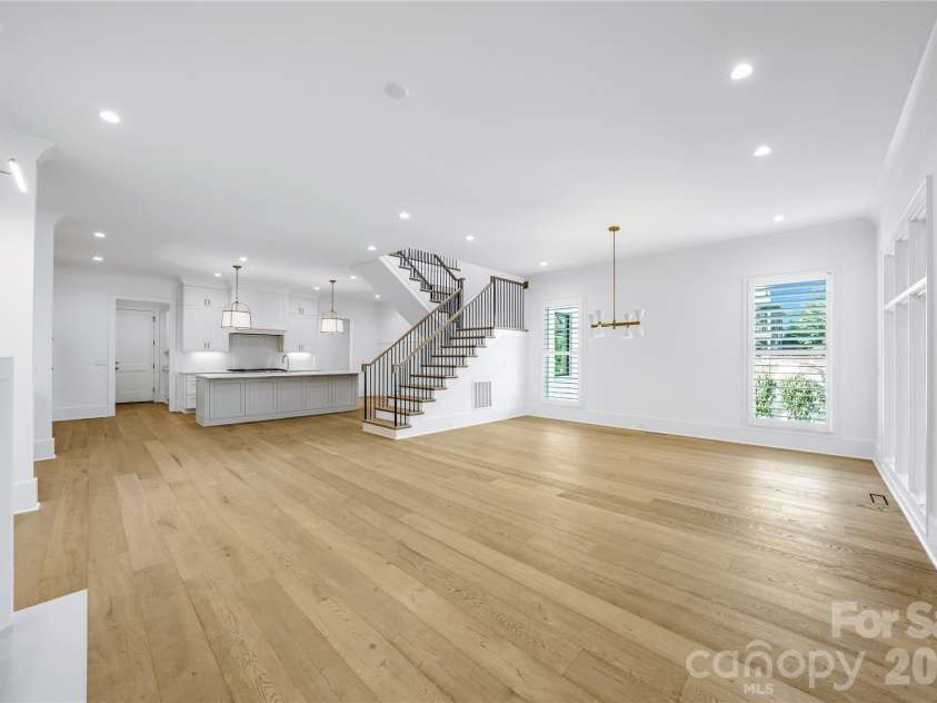 5031 Gilchrist Road, Charlotte, NC 28211.  MLS# CAR4244515, YatesRealty ID 8835. Dining Room and Great Room for Representation