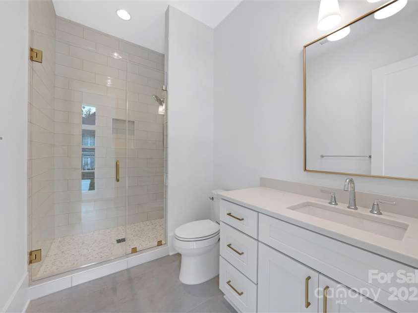 5031 Gilchrist Road, Charlotte, NC 28211.  MLS# CAR4244515, YatesRealty ID 8835. Ensuite Bathroom