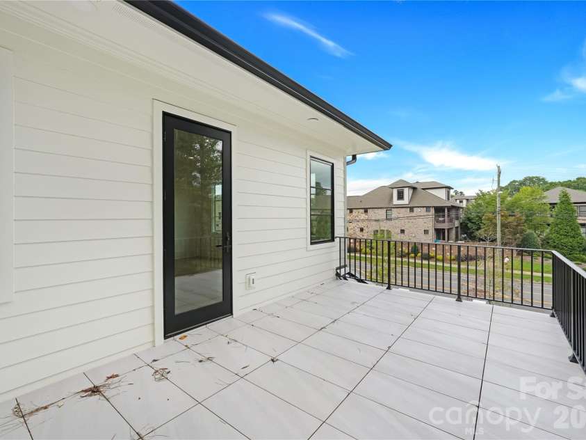 5031 Gilchrist Road, Charlotte, NC 28211.  MLS# CAR4244515, YatesRealty ID 8835. Walk-Out Balcony off Primary Up for Representation
