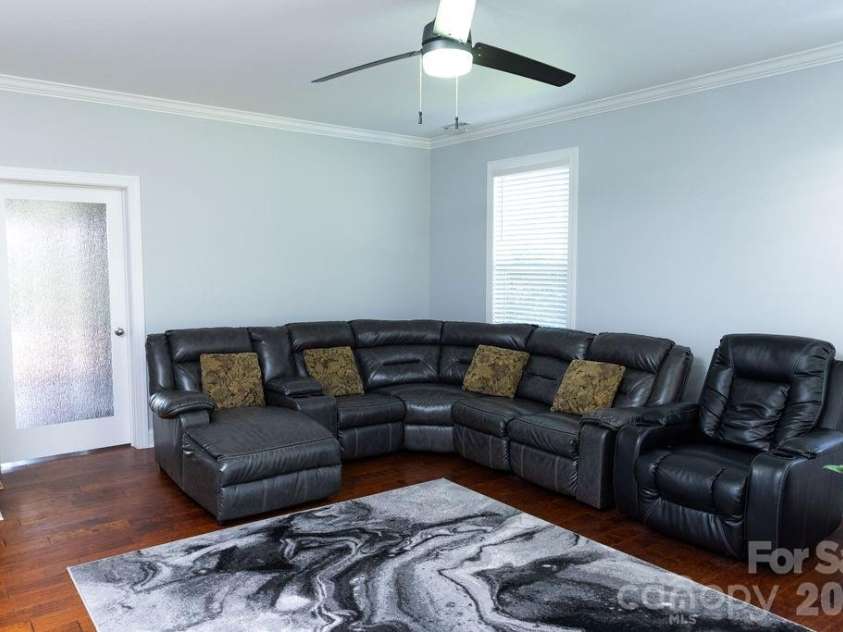 402 Spring Lake Drive, Monroe, NC 28110.  MLS# CAR4358144, YatesRealty ID 8837. Living Room