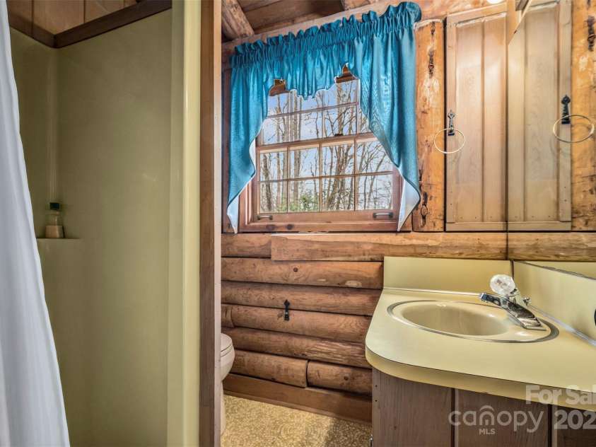 143 Caledonia Road, Landrum, SC 29356.  MLS# CAR4233851, YatesRealty ID 8841. 