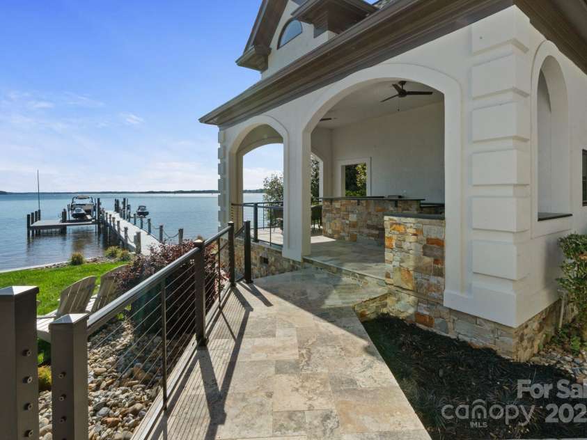 114 Ventana Court, Mooresville, NC 28117.  MLS# CAR4241186, YatesRealty ID 8842. Dine alfresco with panoramic views of Lake Norman.