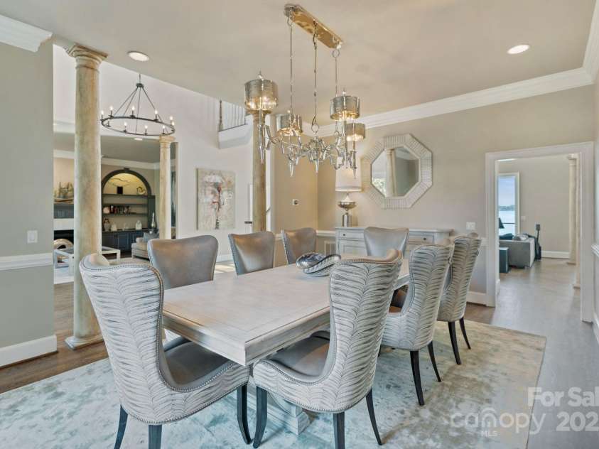 114 Ventana Court, Mooresville, NC 28117.  MLS# CAR4241186, YatesRealty ID 8842. Formal dining room with custom light fixture is great for special occasions.