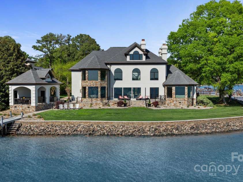 114 Ventana Court, Mooresville, NC 28117.  MLS# CAR4241186, YatesRealty ID 8842. Some of the Best views in Lake Norman and stunning sunsets.