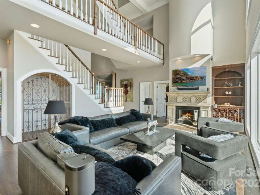 114 Ventana Court, Mooresville, NC 28117.  MLS# CAR4241186, YatesRealty ID 8842. Space under stair would make a perfect wine closet or bourbon display
