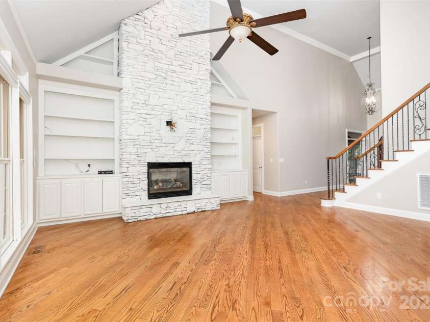 114 Misty Meadows Court, Mooresville, NC 28117.  MLS# CAR4280327, YatesRealty ID 8843. Family Rood with large stone fireplace and built ins