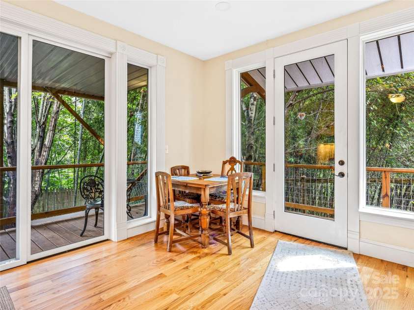 138 French Broad Avenue, Asheville, NC 28801.  MLS# CAR4301394, YatesRealty ID 8844. Downstairs dining area