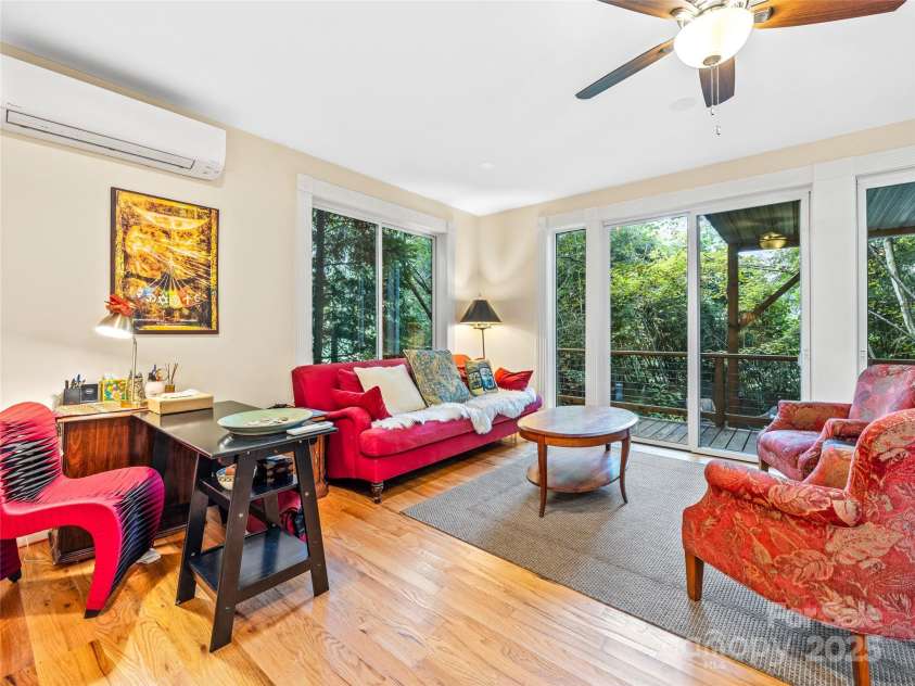 138 French Broad Avenue, Asheville, NC 28801.  MLS# CAR4301394, YatesRealty ID 8844. Downstairs living room