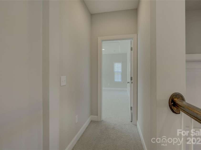 17809 Pawleys Plantation Lane, Charlotte, NC 28278.  MLS# CAR4230692, YatesRealty ID 8846. Hallway to Primary suite
