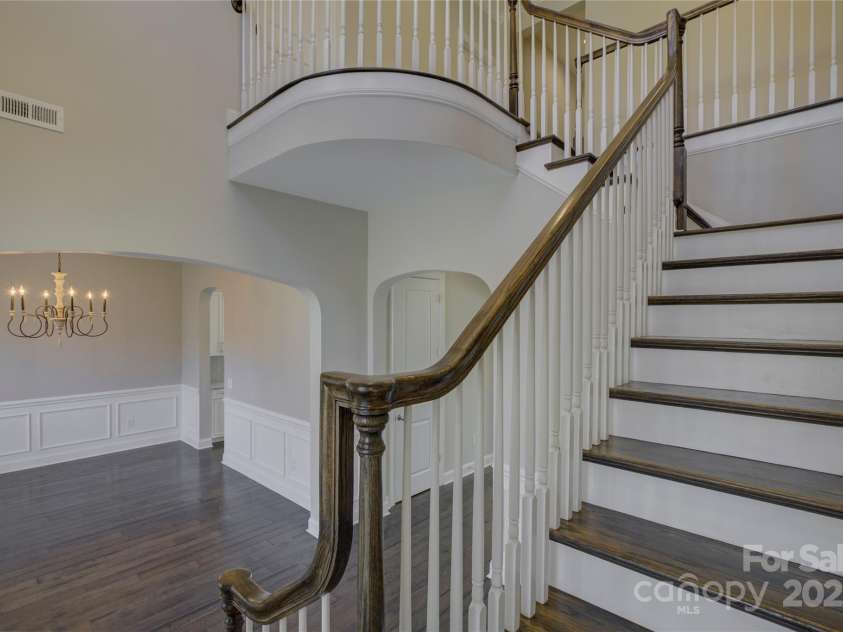 17809 Pawleys Plantation Lane, Charlotte, NC 28278.  MLS# CAR4230692, YatesRealty ID 8846. Stunning staircase to the 2nd floor