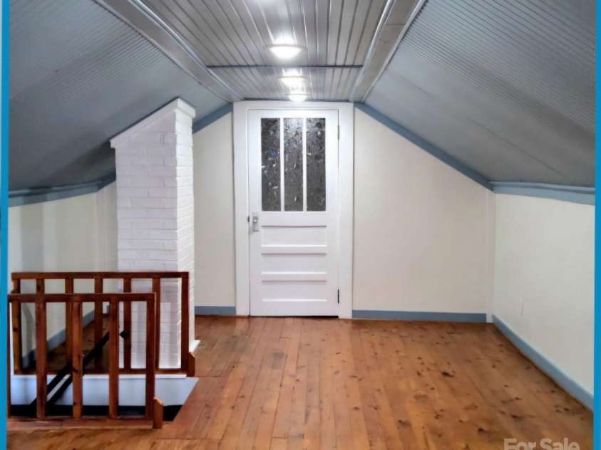 1294 Cane Creek Road, Bakersville, NC 28705.  MLS# CAR4291675, YatesRealty ID 885. Attic makes a great office space.