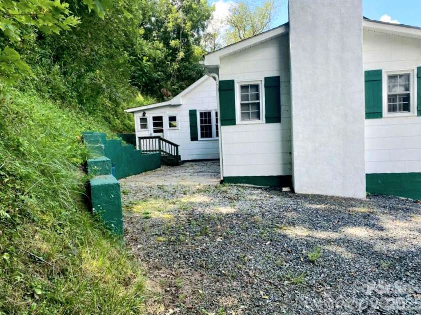 1294 Cane Creek Road, Bakersville, NC 28705.  MLS# CAR4291675, YatesRealty ID 885. Easy access from the level back patio.