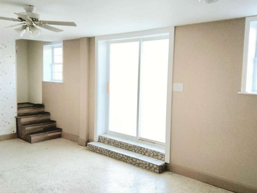 1294 Cane Creek Road, Bakersville, NC 28705.  MLS# CAR4291675, YatesRealty ID 885. Large room to gather for games, and movies.