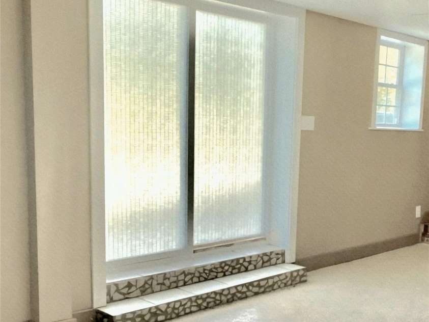 1294 Cane Creek Road, Bakersville, NC 28705.  MLS# CAR4291675, YatesRealty ID 885. Lower level sliding doors.