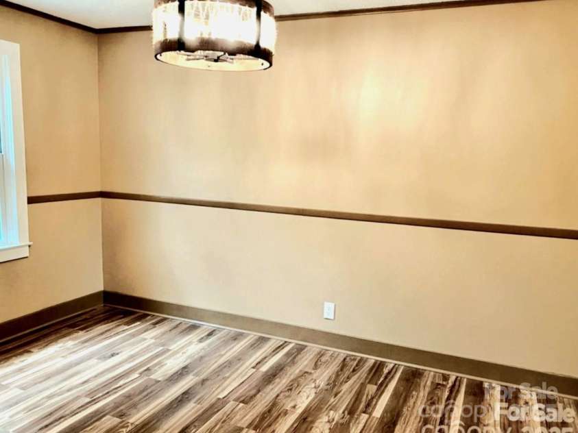 1294 Cane Creek Road, Bakersville, NC 28705.  MLS# CAR4291675, YatesRealty ID 885. Nice features in spacious dining room.