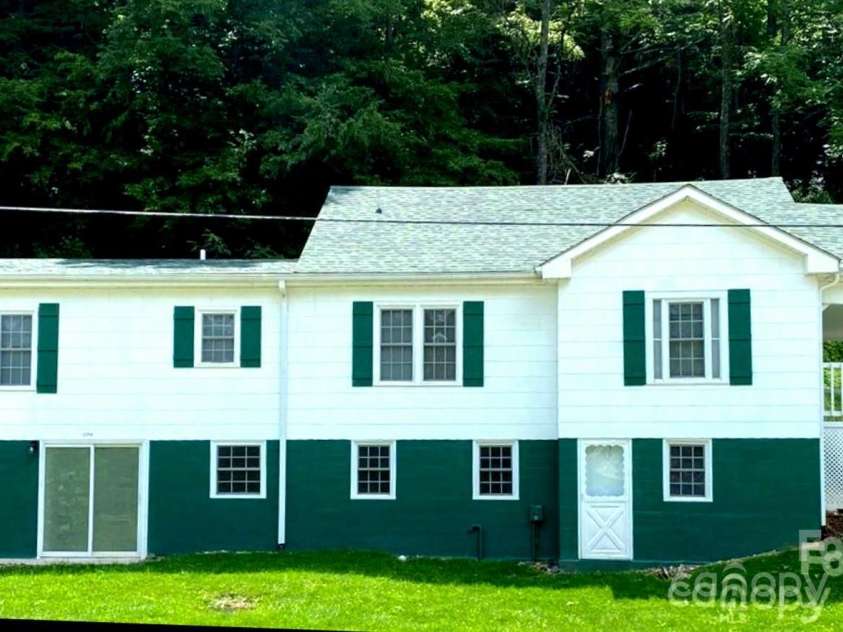 1294 Cane Creek Road, Bakersville, NC 28705.  MLS# CAR4291675, YatesRealty ID 885. Spacious home with beautiful custom features.