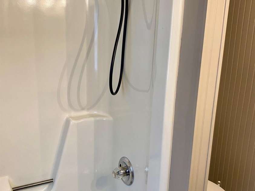 1294 Cane Creek Road, Bakersville, NC 28705.  MLS# CAR4291675, YatesRealty ID 885. Totally renovated bath.