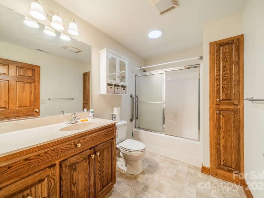 24686 Barbees Grove Road, Oakboro, NC 28129.  MLS# CAR4134946, YatesRealty ID 8851. Full Bath directly across from primary bedroom.