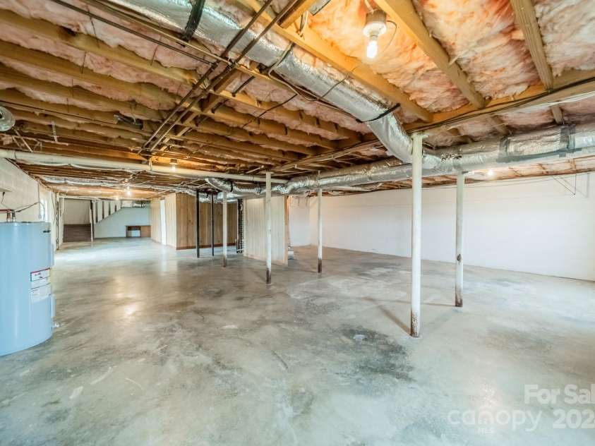 24686 Barbees Grove Road, Oakboro, NC 28129.  MLS# CAR4134946, YatesRealty ID 8851. Full, walk-out basement.