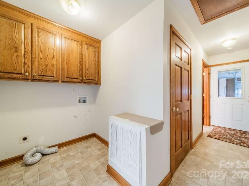 24686 Barbees Grove Road, Oakboro, NC 28129.  MLS# CAR4134946, YatesRealty ID 8851. Laundry