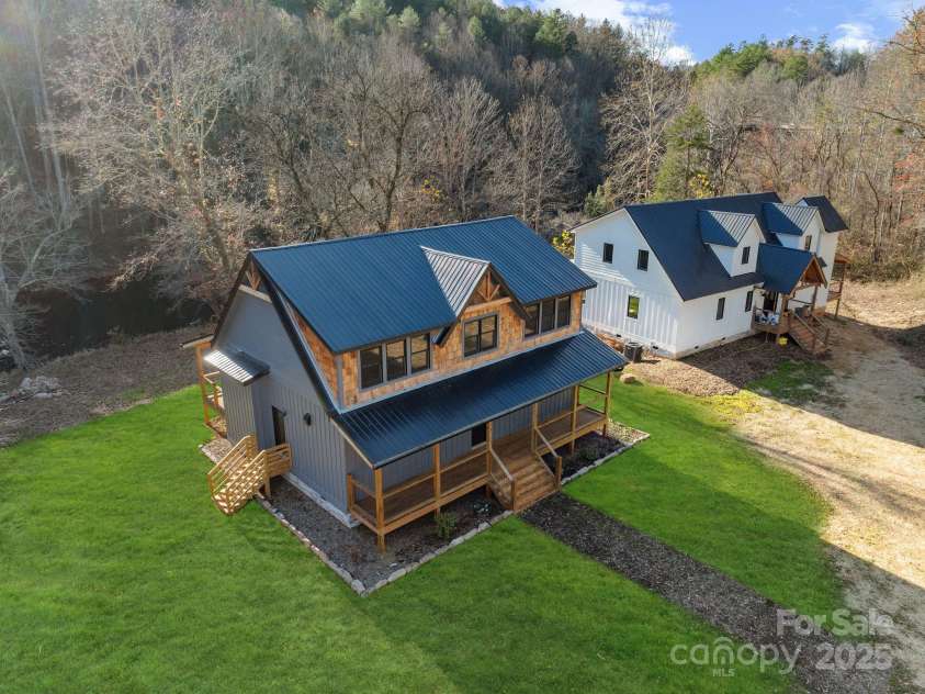 124 Light Waters Drive, Cullowhee, NC 28723.  MLS# CAR4220899, YatesRealty ID 8853. 