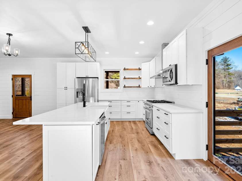 124 Light Waters Drive, Cullowhee, NC 28723.  MLS# CAR4220899, YatesRealty ID 8853. 