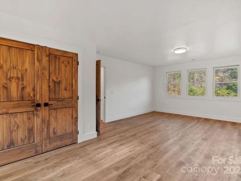 124 Light Waters Drive, Cullowhee, NC 28723.  MLS# CAR4220899, YatesRealty ID 8853. 