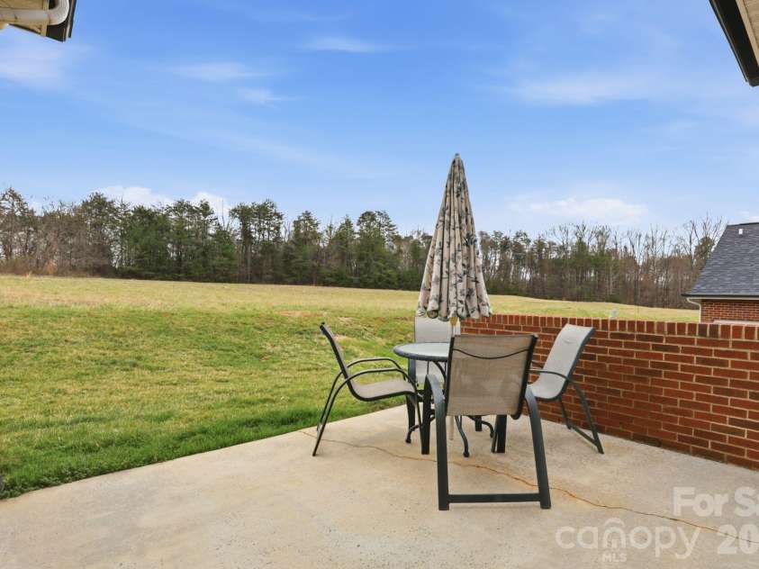3900 Azalea Trail, Denver, NC 28037.  MLS# CAR4353050, YatesRealty ID 8855. Back Patio