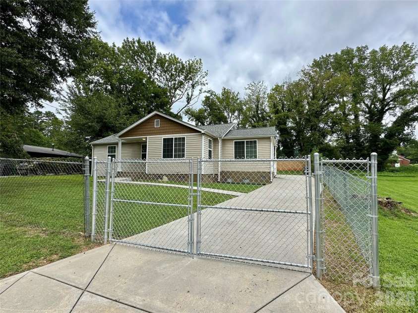 2510 Sherrill Street, Charlotte, NC 28208.  MLS# CAR4294165, YatesRealty ID 8858. Front gate